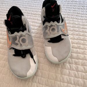 Women’s nike air zoom basketball sneakers.